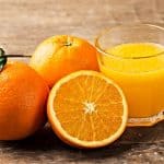 fresh squeezer orange juice and oranges