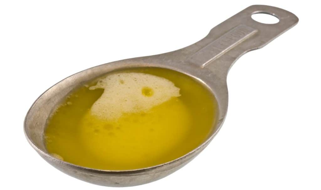 measuring spoon of butter extract