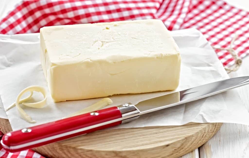 stick of butter with butter knife