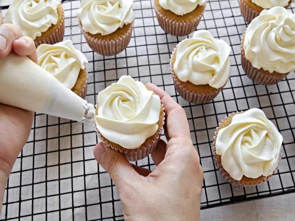 cupcakes decorated with vanilla frosting