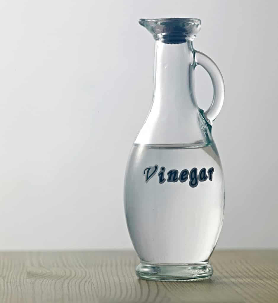glass carafe of distilled white vinegar