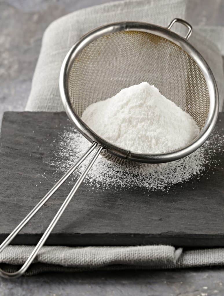 powdered sugar in a sifter